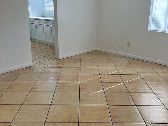 living room view to kitchen