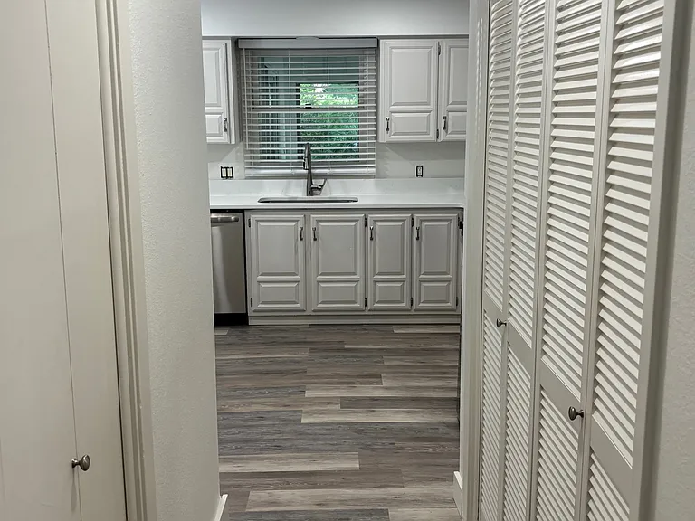 Bulter's pantry, indoor laundry leads to kitchen