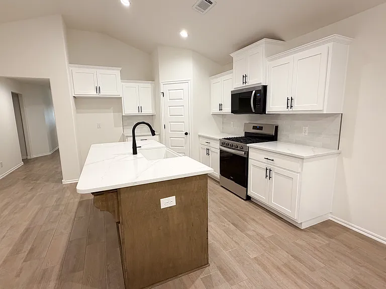 9407 N 116th East Ave — Photo 2