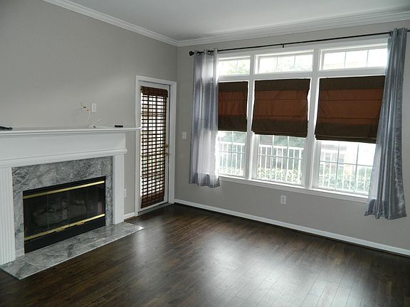 Living room opens up to balcony