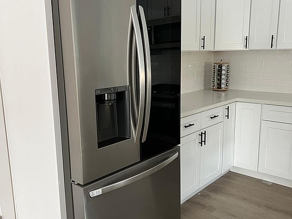 Gorgeous new LG French door fridge in this full size kitchen