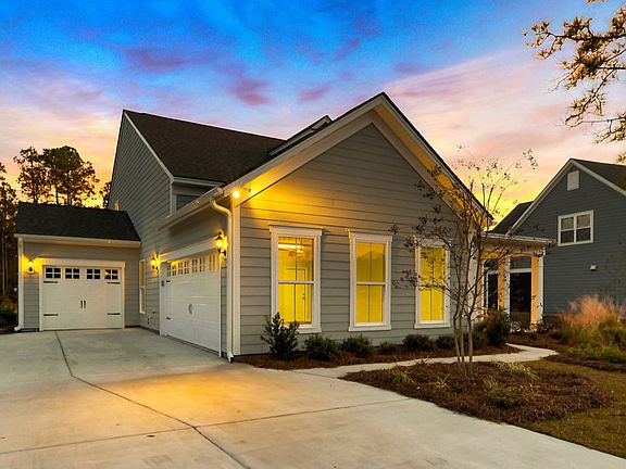Two car garage with additional golf cart garage