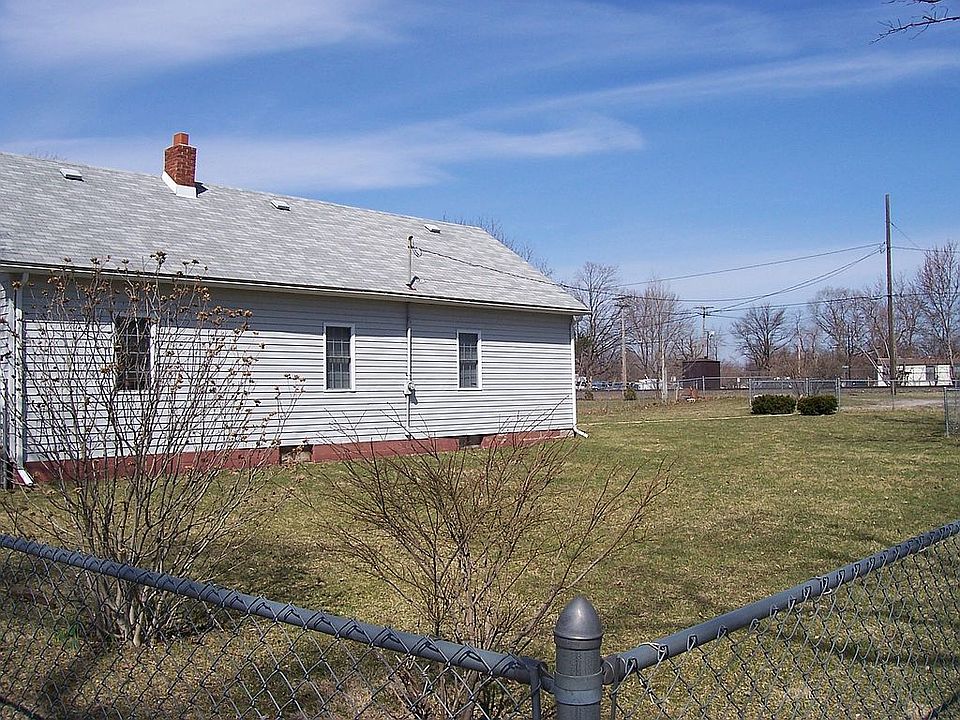 side of home + yard