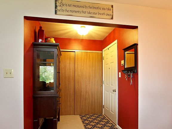 Foyer entering into the condo with a nice size coat closet!