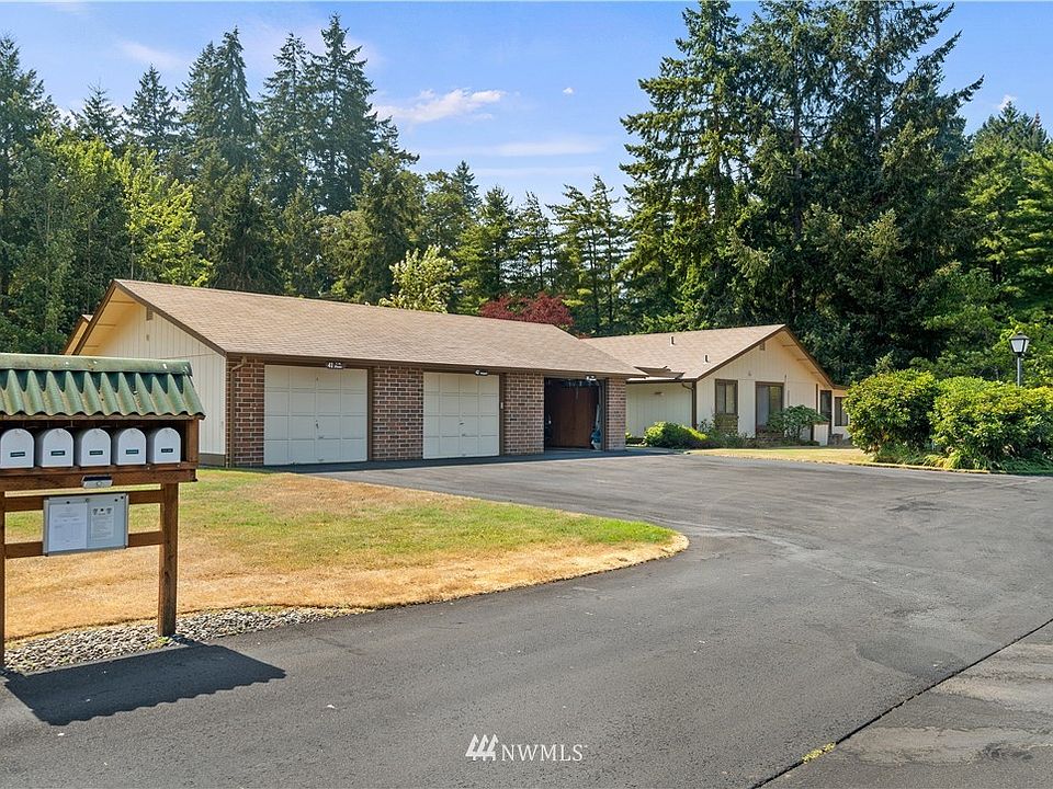 Front view of condo, your garage is the middle one. Condo on right-hand side.