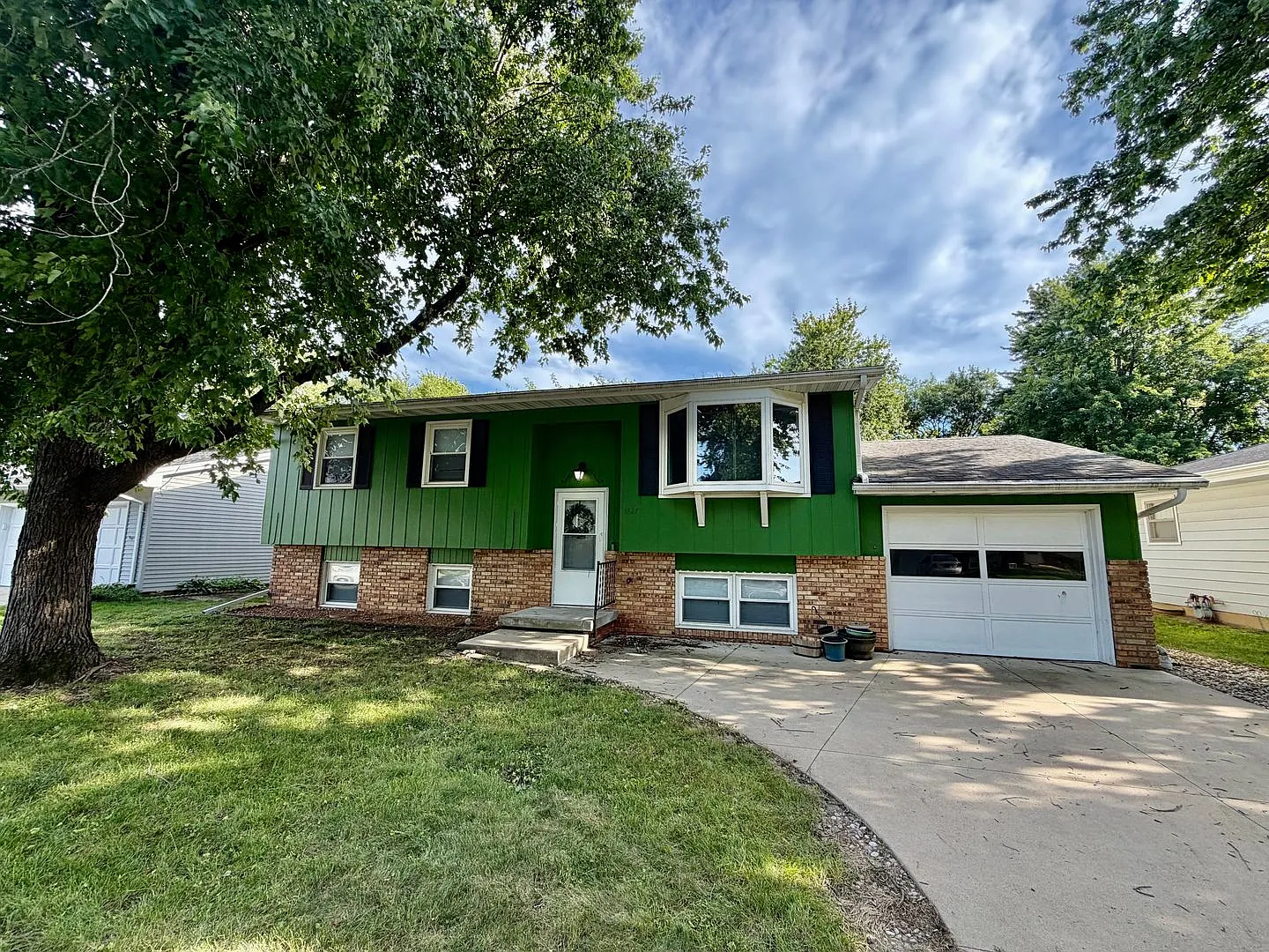 Spacious Bi-Level Home with Finished Basement & Huge Backyard! — Photo 1