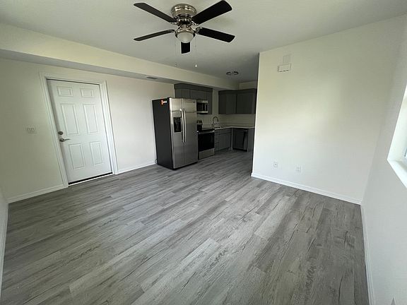 Living room with view to the kitchen