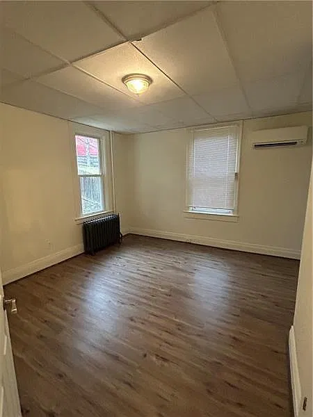 208 W College St #1A