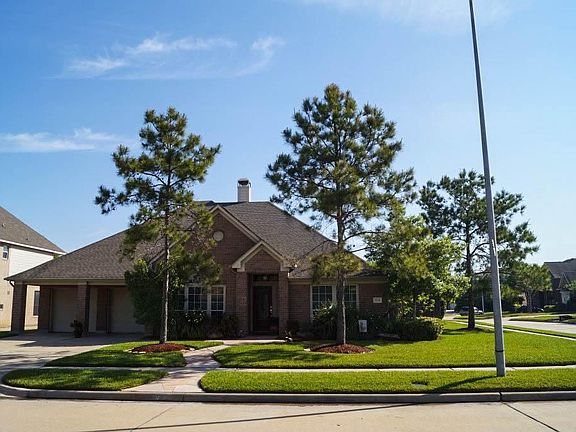 Set on 0.21/acre corner lot in Springbrook in Silverlake