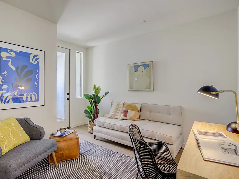 Second bedroom or office located on the third floor with its own private balcony.