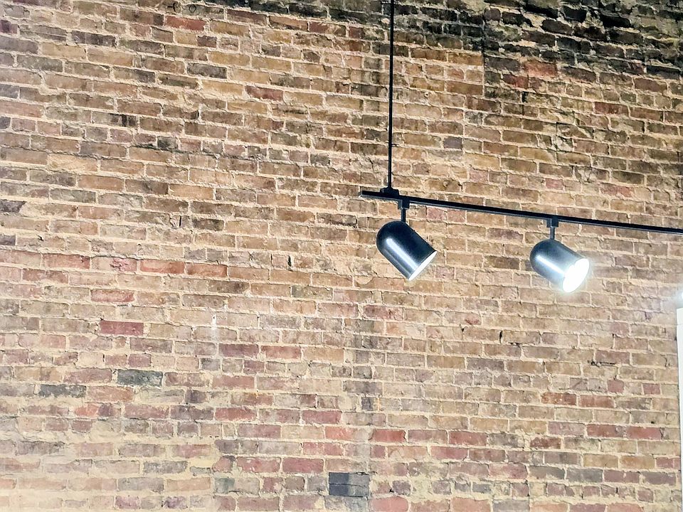 Exposed brick 20 ft ceilings