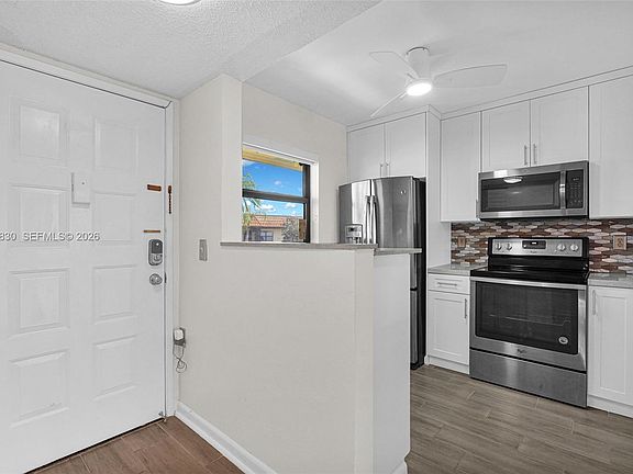 5th image of 7142 Golf Colony Ct APT 206