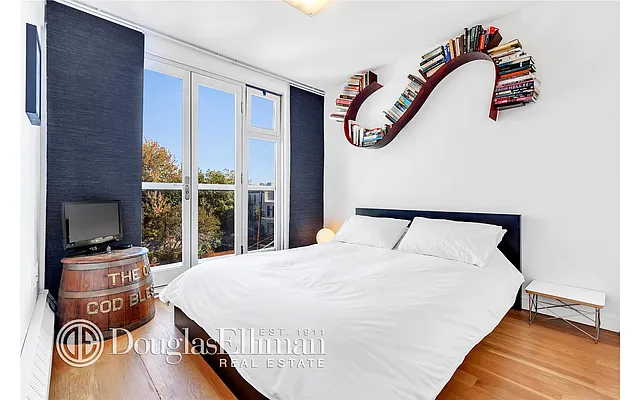 Sold by Douglas Elliman | media 18