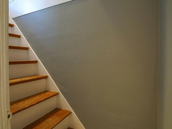 Stairs to bedroom and bathroom