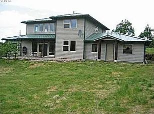 The Attached apartment is to the right of the photo.