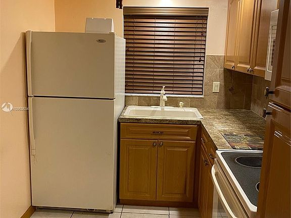 4th image of 11003 Royal Palm Blvd #5