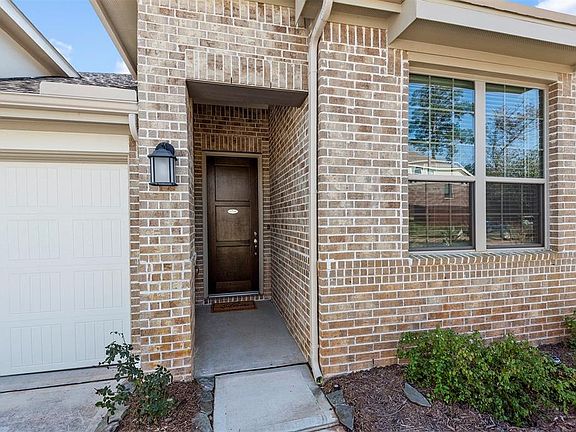The brick elevation and the tall door are perfect for this entry.