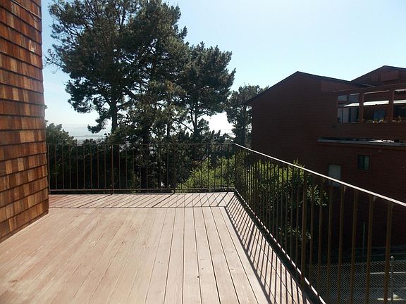 Very large deck for outdoor meals and basking in the sun.