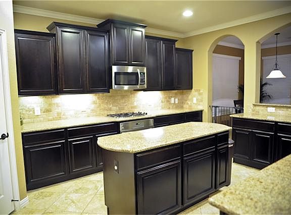 This kitchen is a must-see.  Granite counters, upgraded stained cabinetry with tons of storage and counter space.
