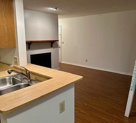 View of Living room from bar area of kitchen