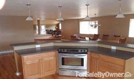 Summer View 2011
						:
						View from the dining room/kitchen window after a rain storm