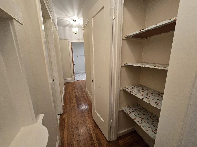 Hallway with closets