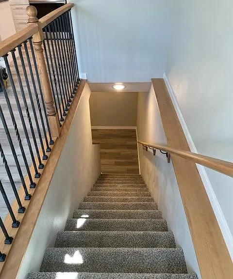 Stairs to Basement, 2 Bedrooms, laundry/utility room and bonus room