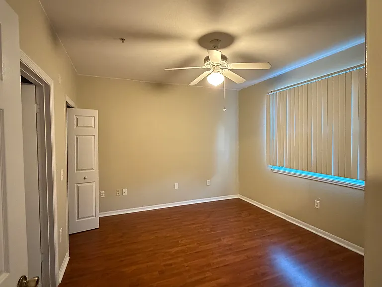 Room 1: Includes a private bathroom with a bathtub and shower, along with a built-in closet.