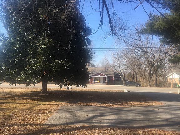 Additional concrete parking spot in the front yard.