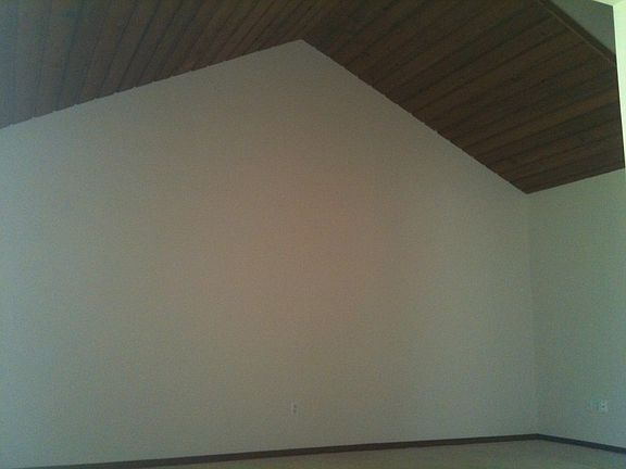 LIvingroom w/ cathedral ceiling