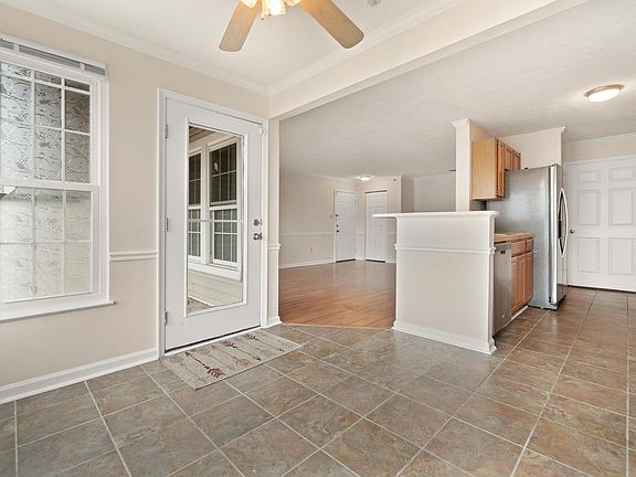 Dining Area looking toward Private Entrance, Kitchen and Living Room
