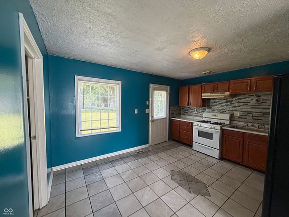 5th image of 6714 E 43rd Pl