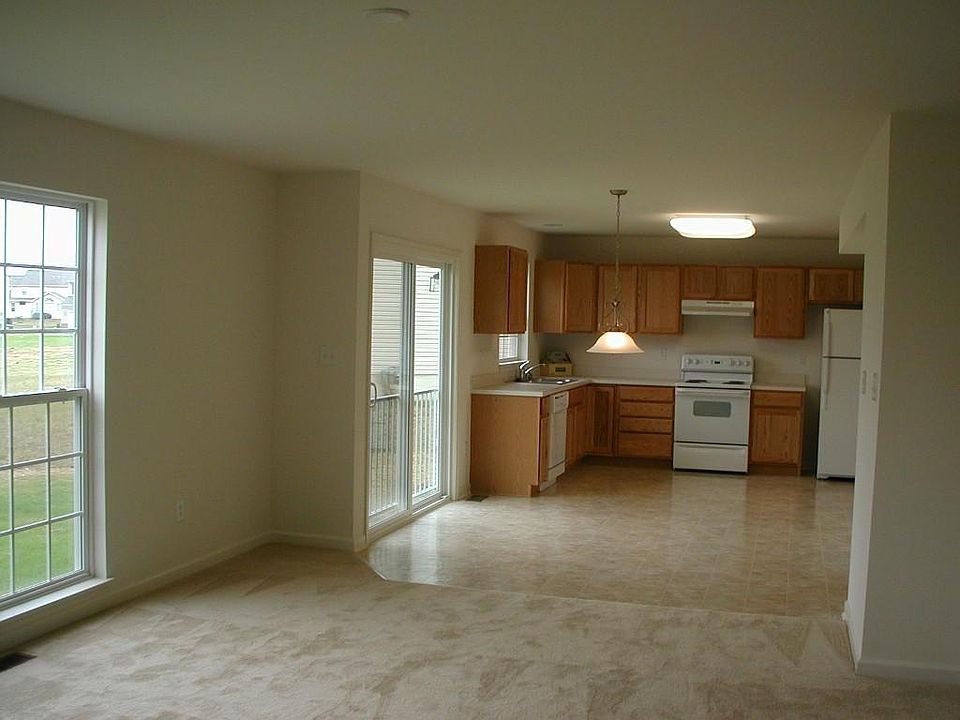 View from family room to kitchen dining area--NOT PICTURED are deck and partial fenced yard added.