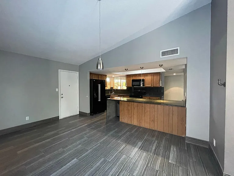 Looking into the dining room and kitchen.