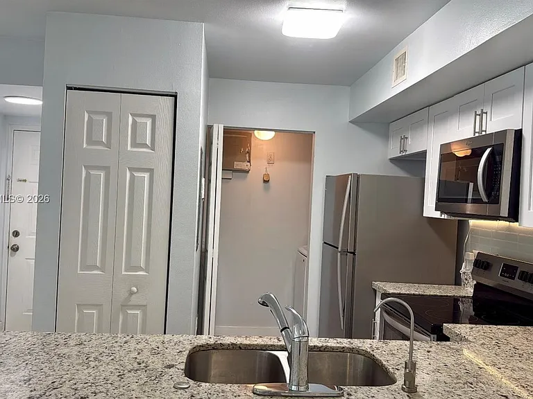 11155 SW 5th Pl #302 — Photo 3