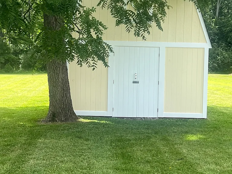 Large backyard with shed