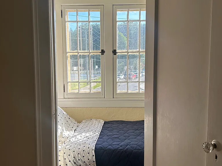 Bedroom 4 (tiny) with fold-out secretary desk and under-bed storage