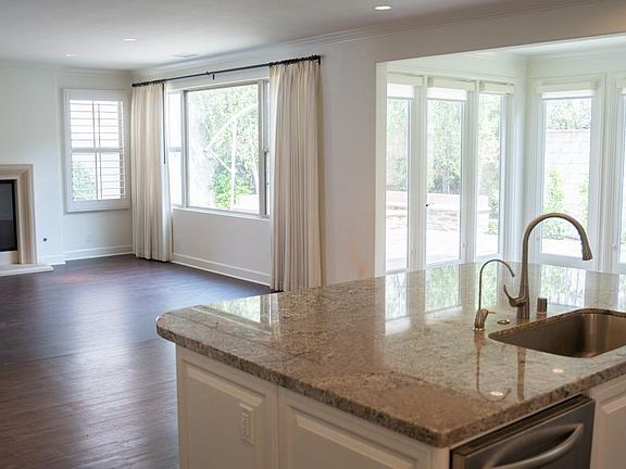 Great room with conservatory and granite counter-island