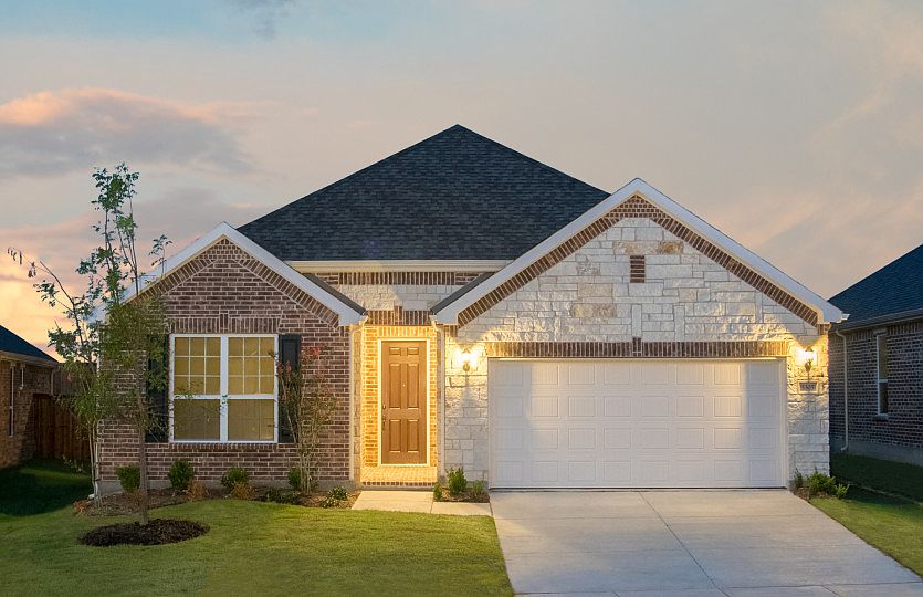 The Mckinney, a one-story home with 2-car cedar garage, shown with Home Exterior D