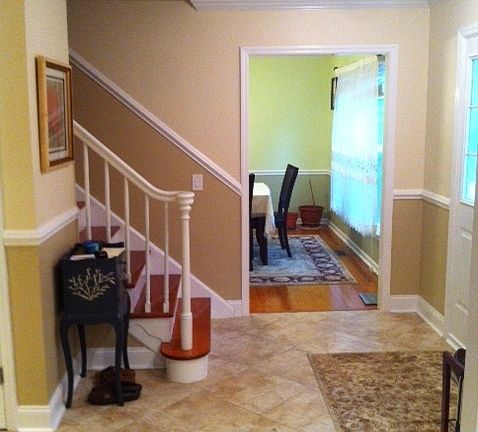 Marble foyer leads to formal dining room