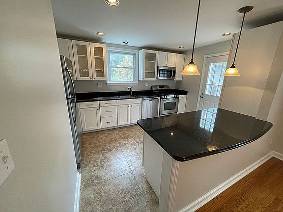 Kitchen leading to deck