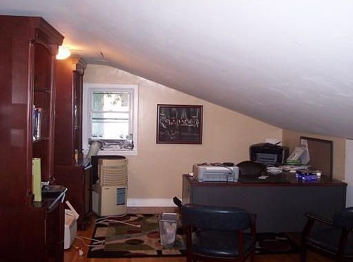 BACK ROOM OFF GAME ROOM CONVERTED TO 2 OFFICE AREAS