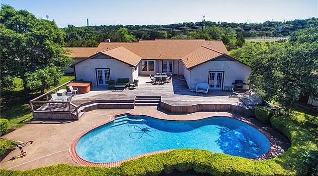 Imagine coming home to Hill Country views, a sparkling pool and your dream home at 19104 Terrace Mountain Drive.
