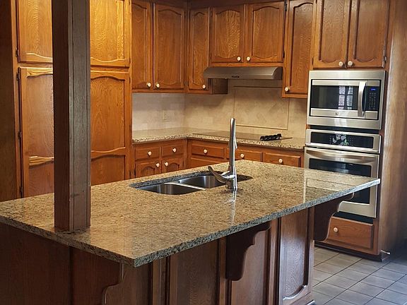Updated kitchen - chefs pantry opens all the way up for lots of food storage