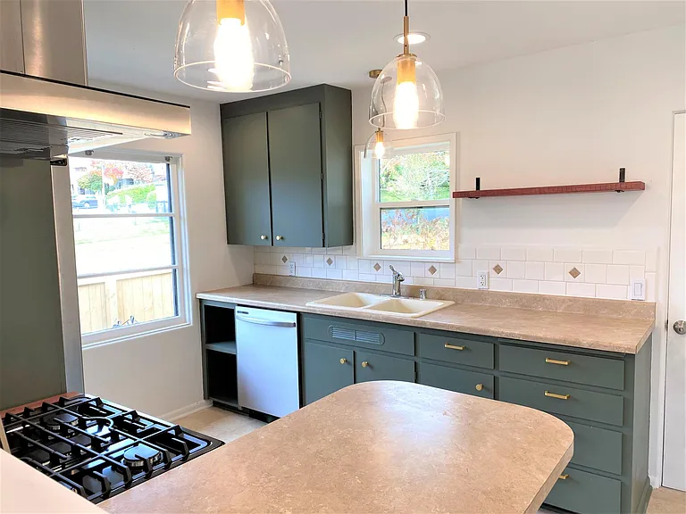 Plenty of storage and counter space with additional storage under kitchen peninsula.