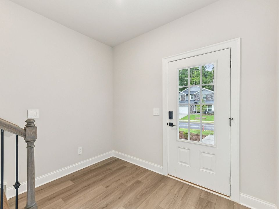 The Ashland floorplan with the Upscale Rustic Linen interior package.