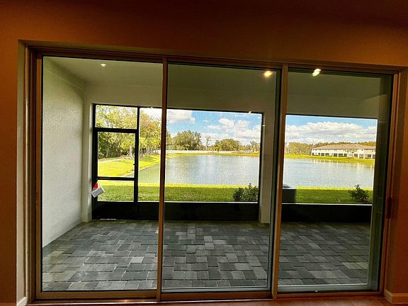 screened patio with a beautiful view
