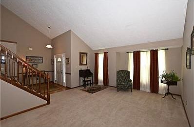 Formal living room. Fresh paint, newer carpets. Vaulted ceilings.