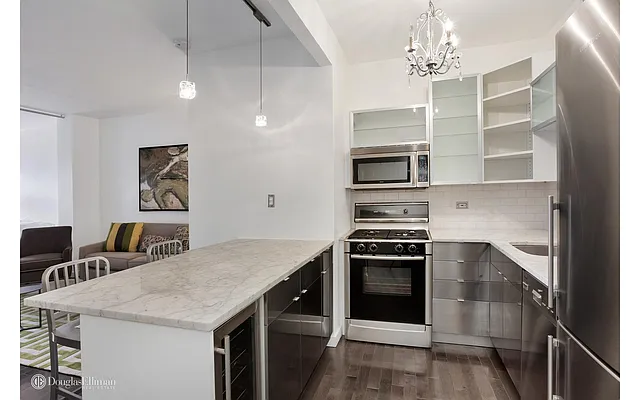 Sold by Douglas Elliman | media 13