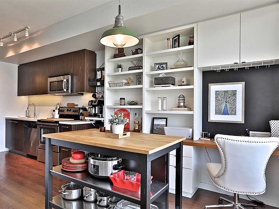 Dining area and built in desk and shelves